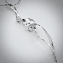 Load image into Gallery viewer, wave necklace is modern, stryking expression of a self confident woman.
