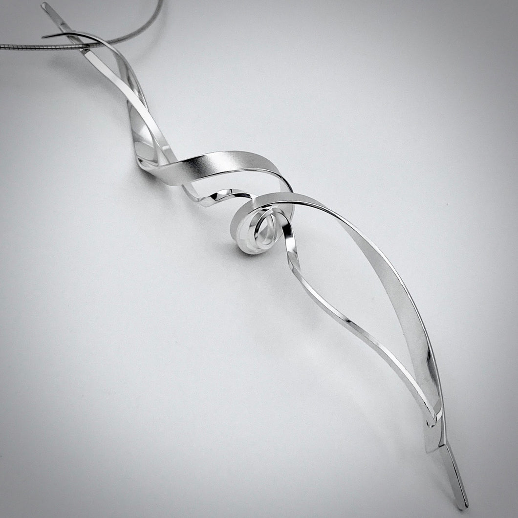 wave necklace is modern, stryking expression of a self confident woman.